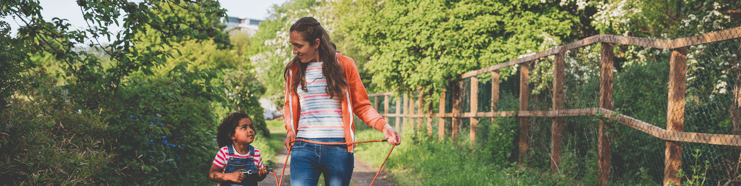 Women walking a dog